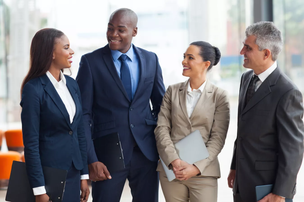 Group of students in business attire standing together